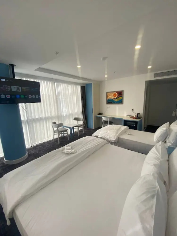 Standard Triple Family room with city view