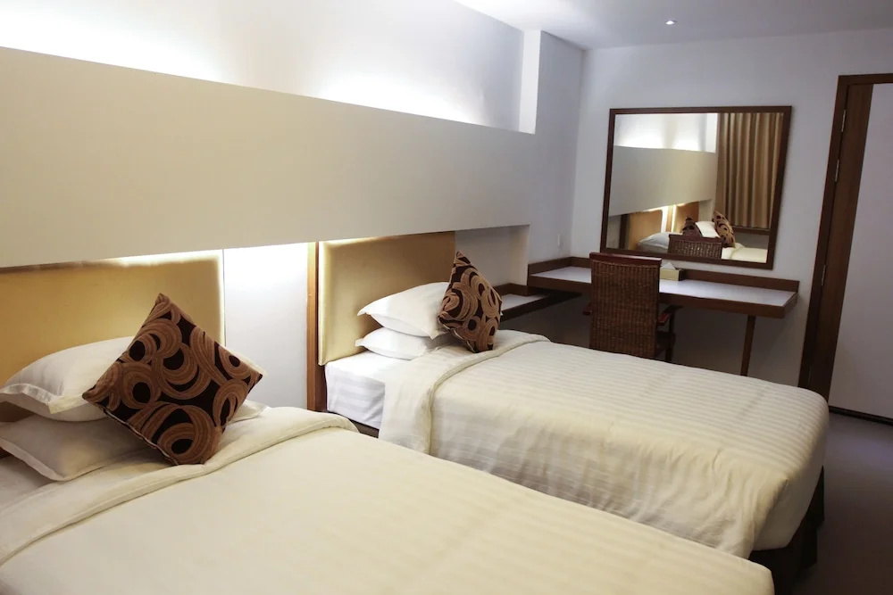 The RGN City Lodge - Chambres