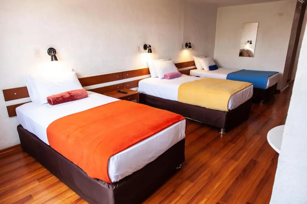 Hotel Holiday Suites - Chambres