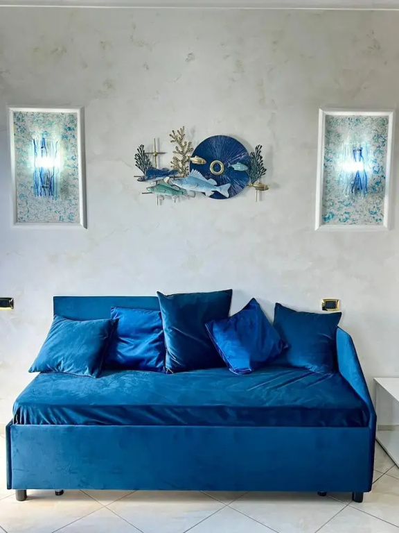 Superior Triple room with balcony and with sea view