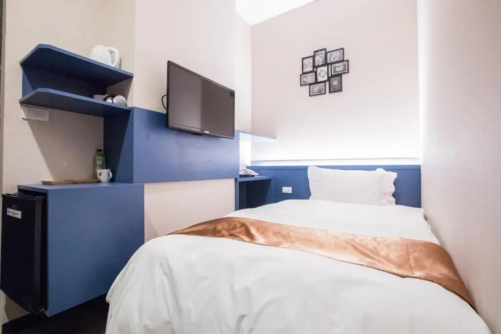 Travel Art Inn - Chambres