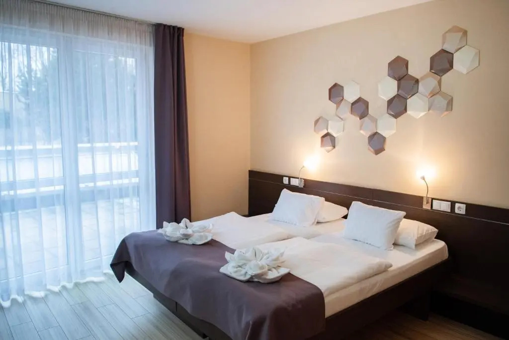 CE Plaza Hotel - Chambres