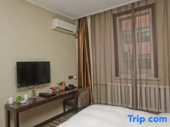 Dalian Yuan Hotel - Chambres