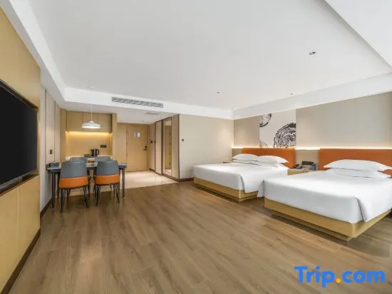 Xinyue Hotel - Chambres