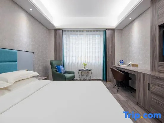 Qiongdu Hotel - Chambres