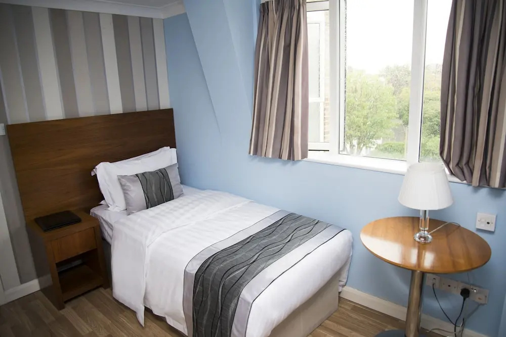 The New London Carlton Hotel & Service Apartments - Chambres