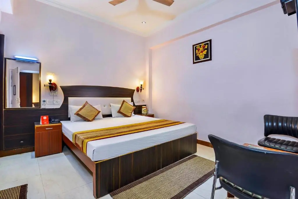 OYO 5539 Merit Hotel - Chambres