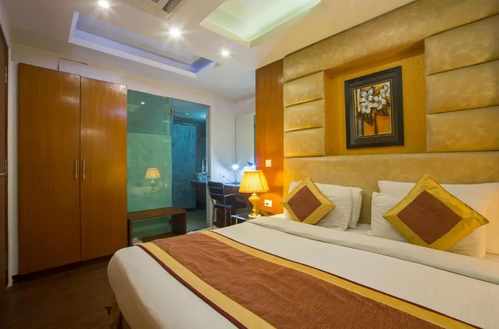 Trimrooms Palm D'or - Chambres