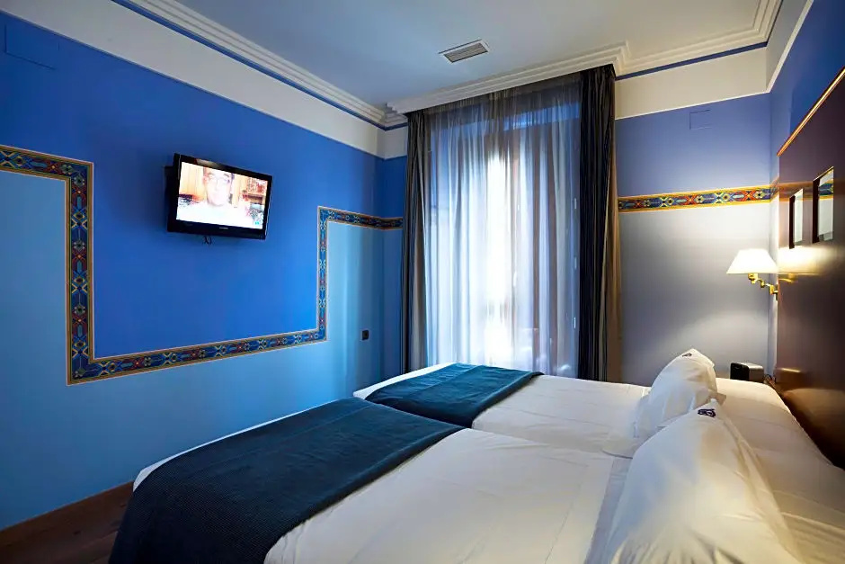 Suites Gran Via 44 Apartahotel - Chambres