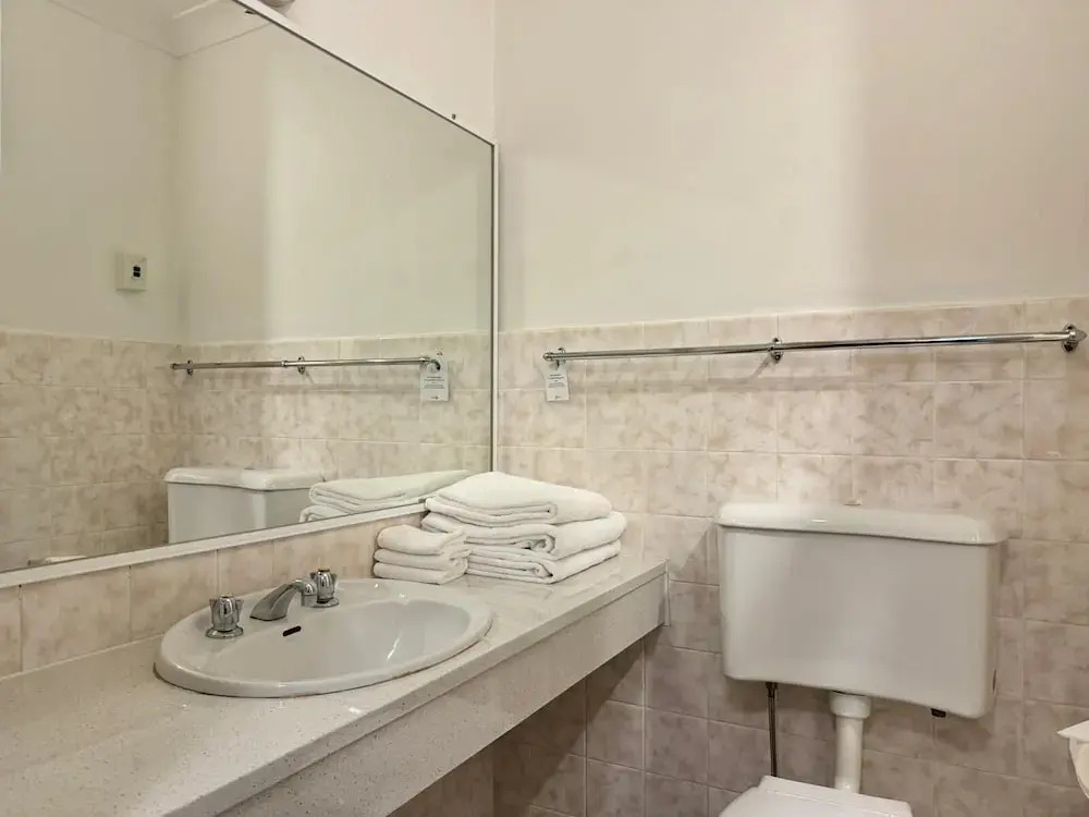 尊爵四人房，配有兩張單人床