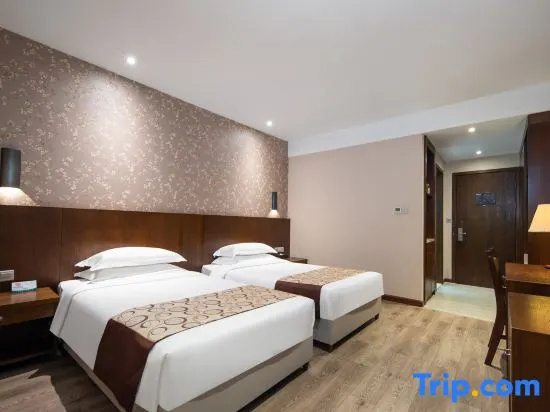 Xinhua Hotel - Chambres
