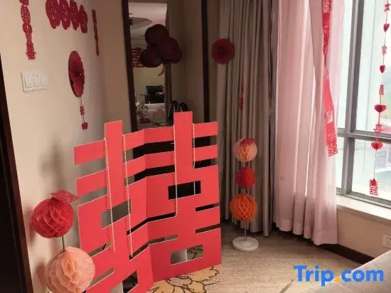 Xinli Hotel - Chambres