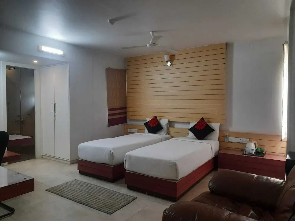 Roseline Suites - A Business Hotel - Chambres