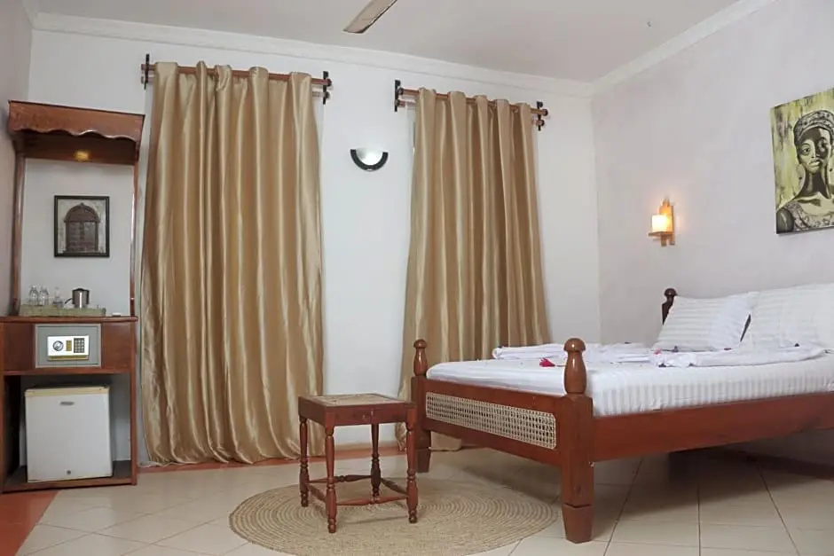 Chukwani Executive Inn - Chambres