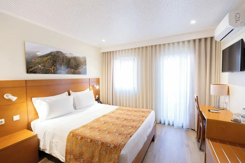 Superior Double room with balcony and with city view (full double bed)