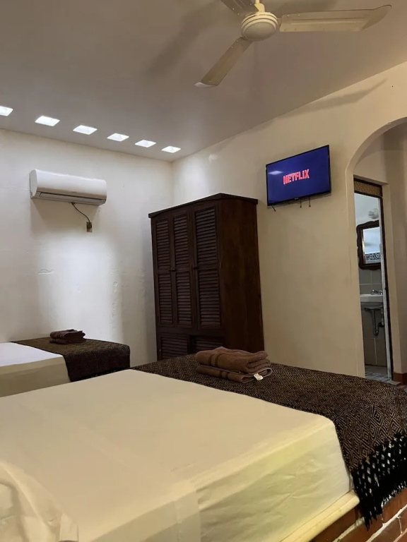 Standard Quadruple Family room with view
