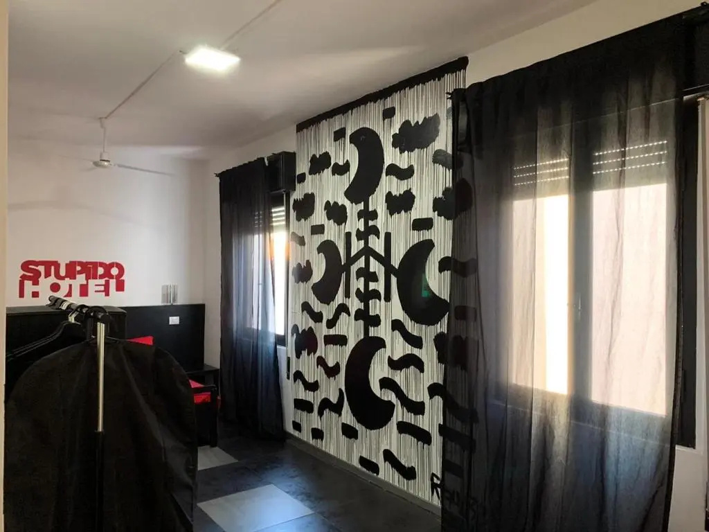Stupido Hotel - Chambres