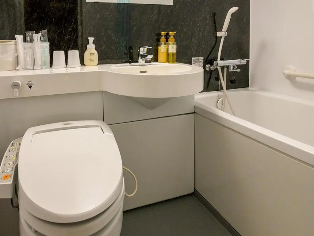 Tokai City Hotel - Chambres