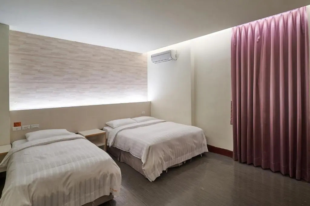 Yung An Business Hotel - Chambres