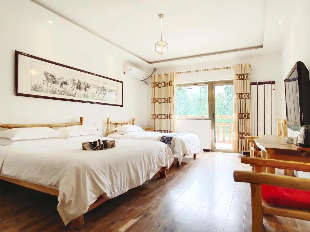 Dunhuang Silk Yododo Inn - Chambres