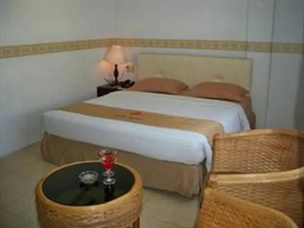 Griya Hotel - Chambres
