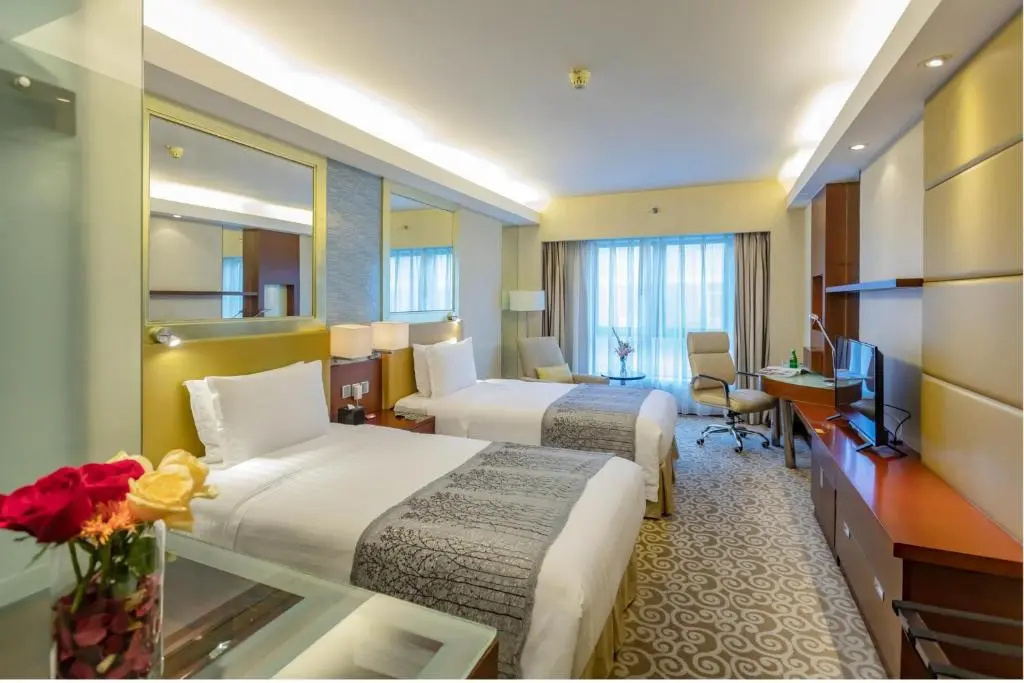 Guo Ji Yi Yuan Hotel - Chambres