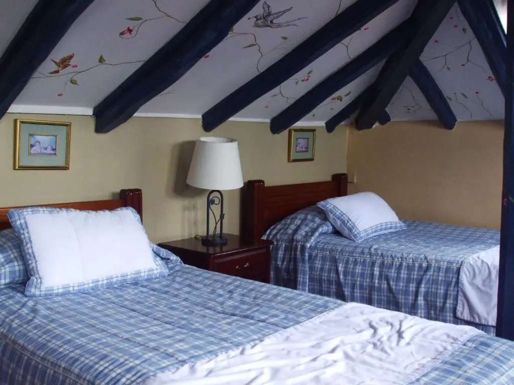 Hotel Posada del Ángel - Chambres