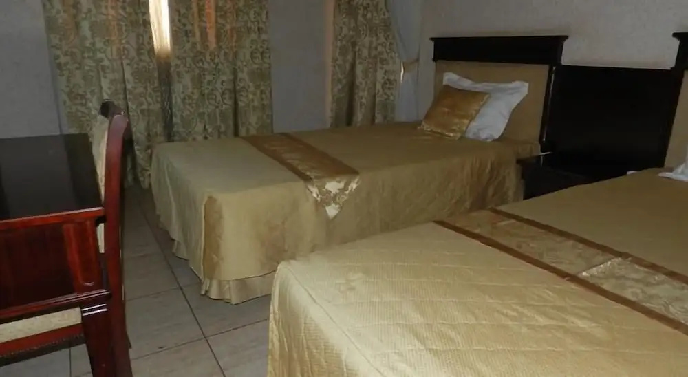 Crown Jakiba Hotel - Chambres