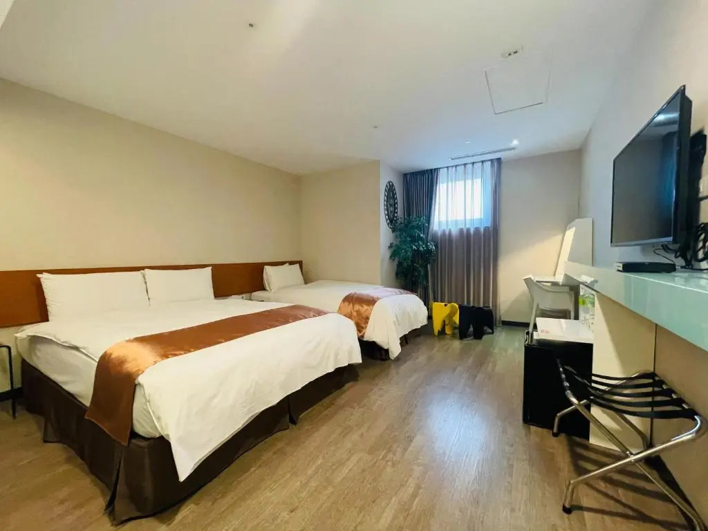 Travel Art Inn - Chambres