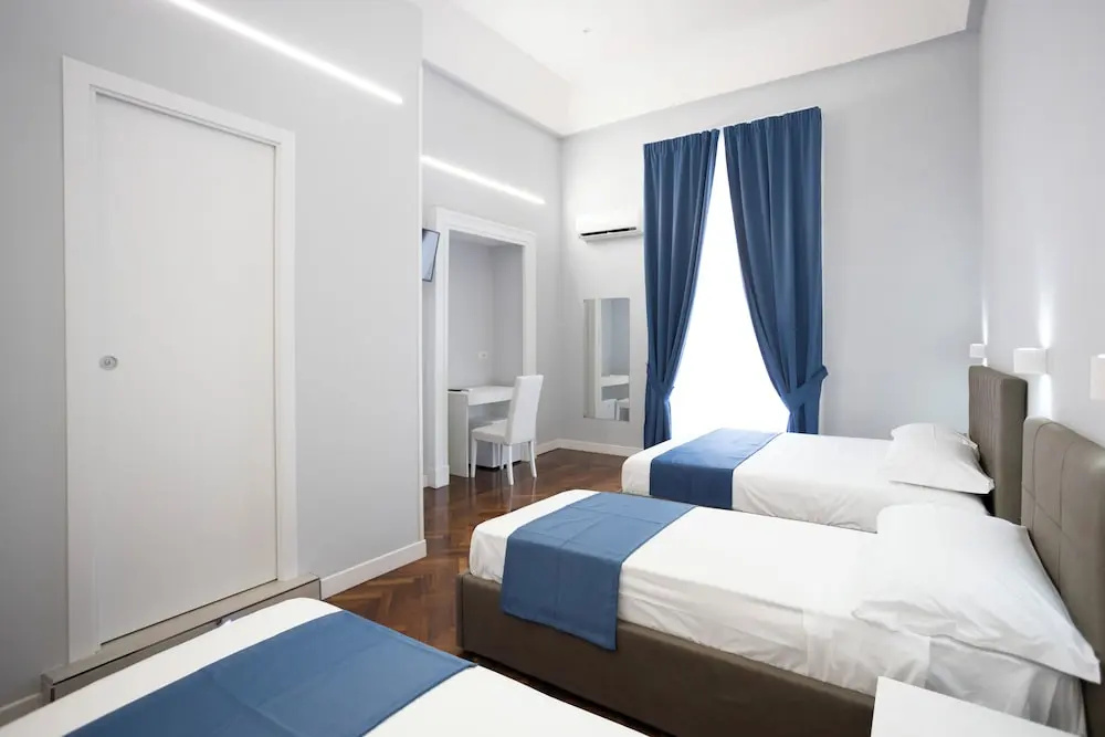 Deluxe Quadruple room with balcony