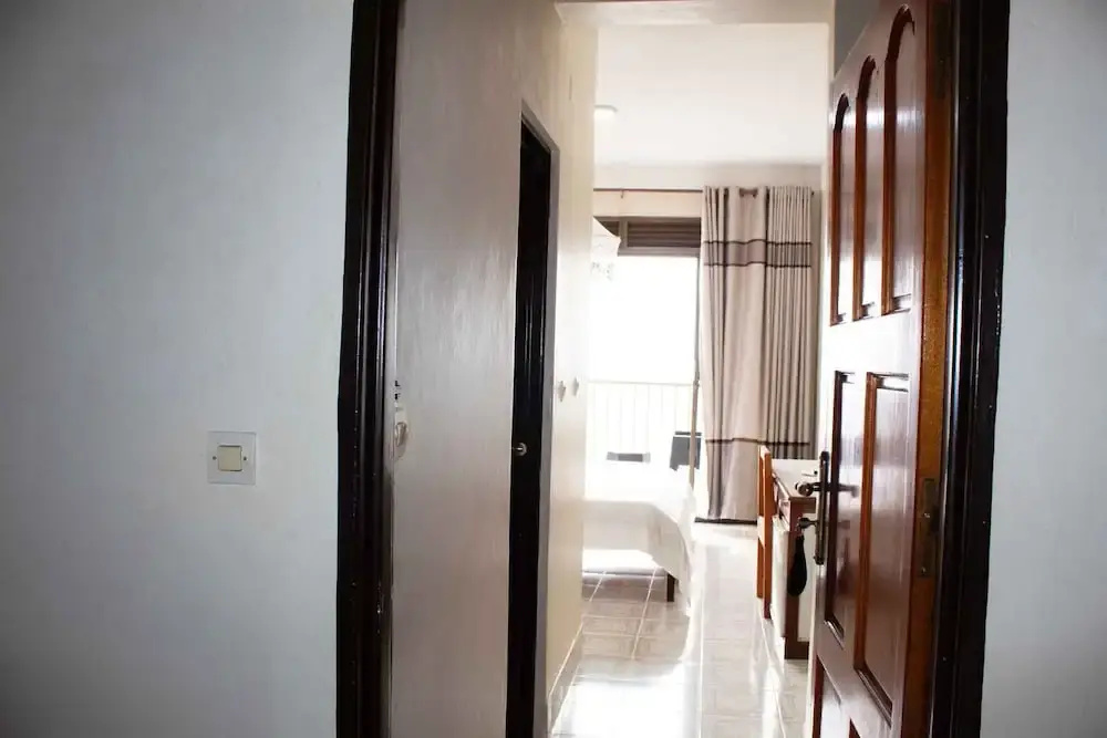 Okapi Hotel - Chambres