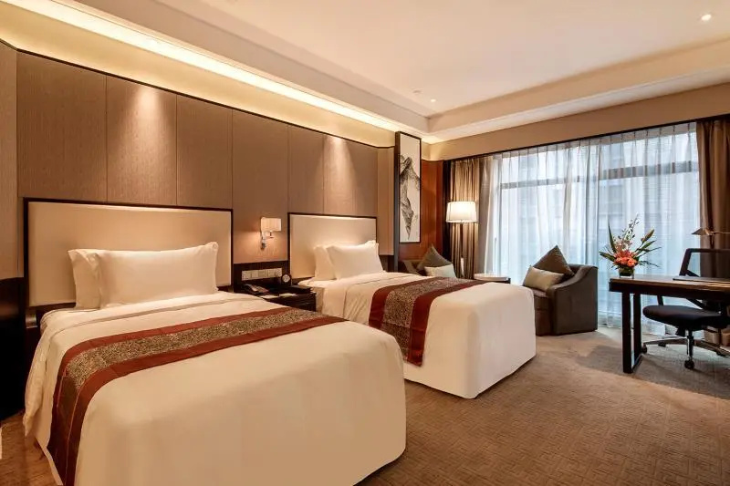 Howard Johnson Jinyi Hotel Chongqing - Chambres