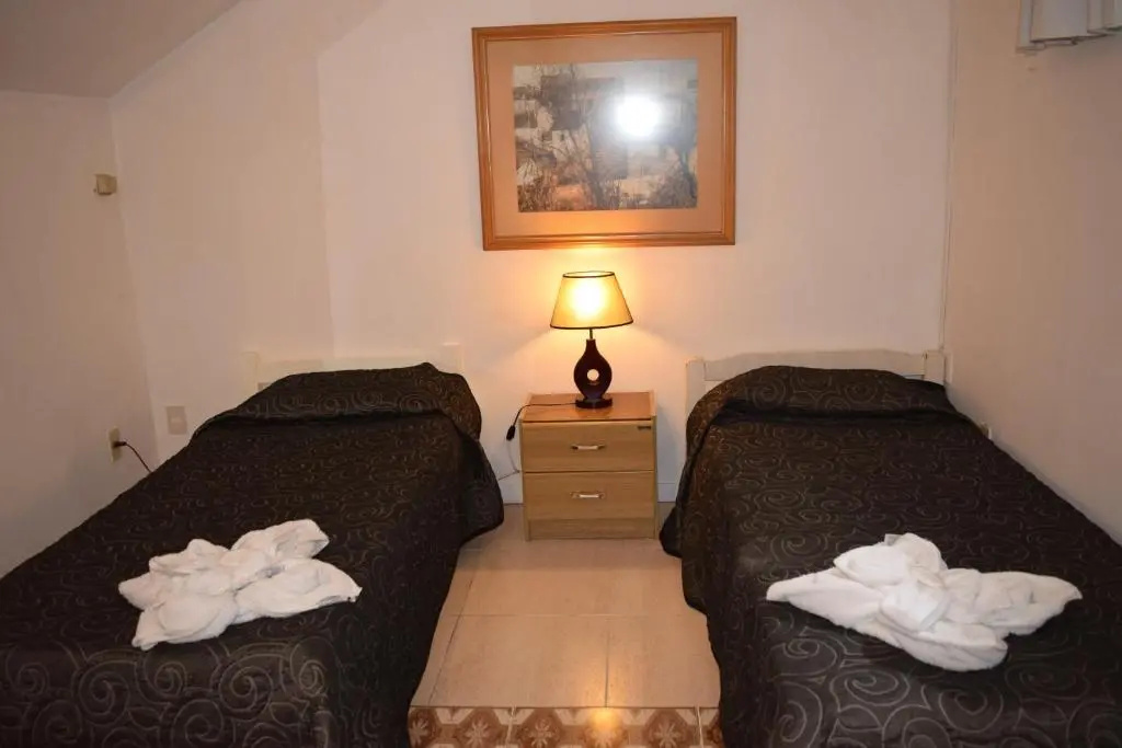 Nuevo Hotel Plaza - Chambres