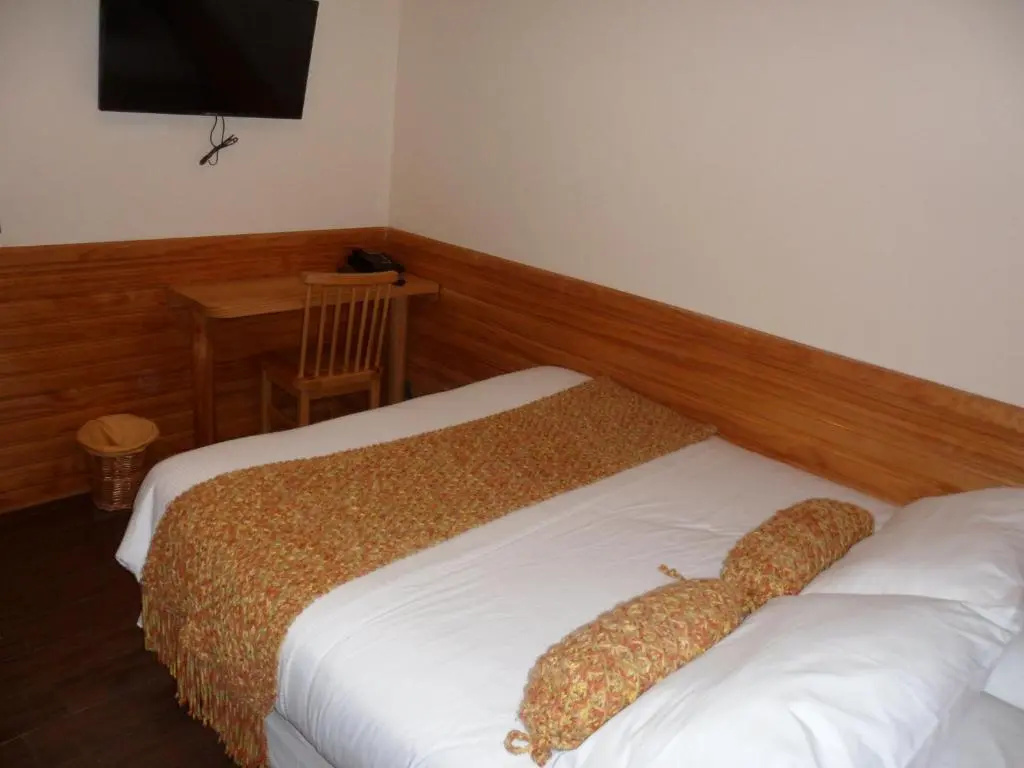 Hotel y Departamentos Dein Haus - Chambres