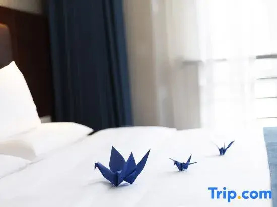 Harmonious Dunpu Hotel - Chambres