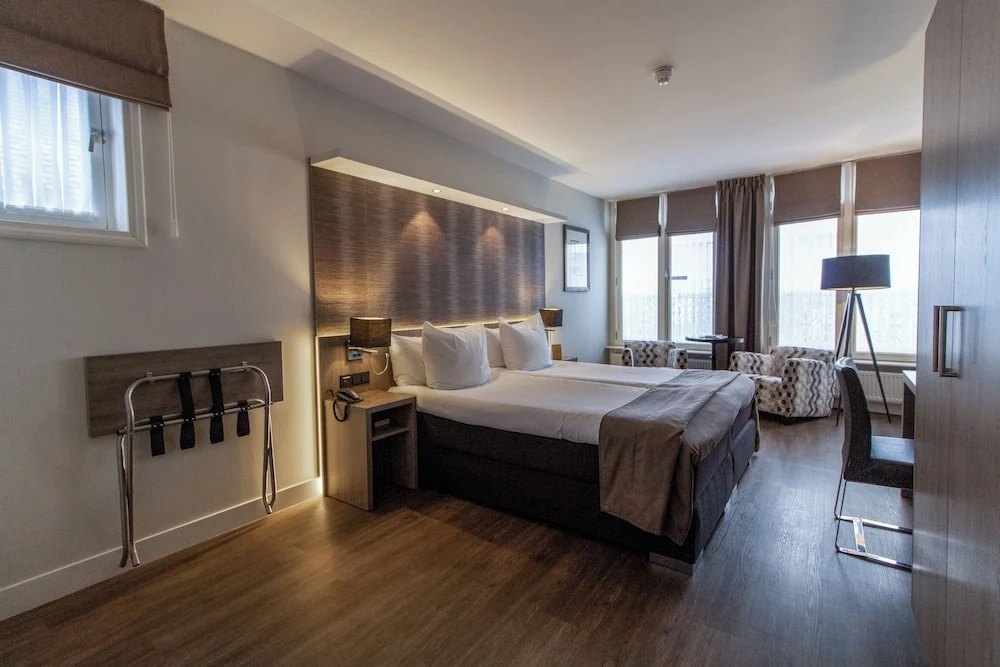 Grand Hotel en Résidence De Draak - Chambres