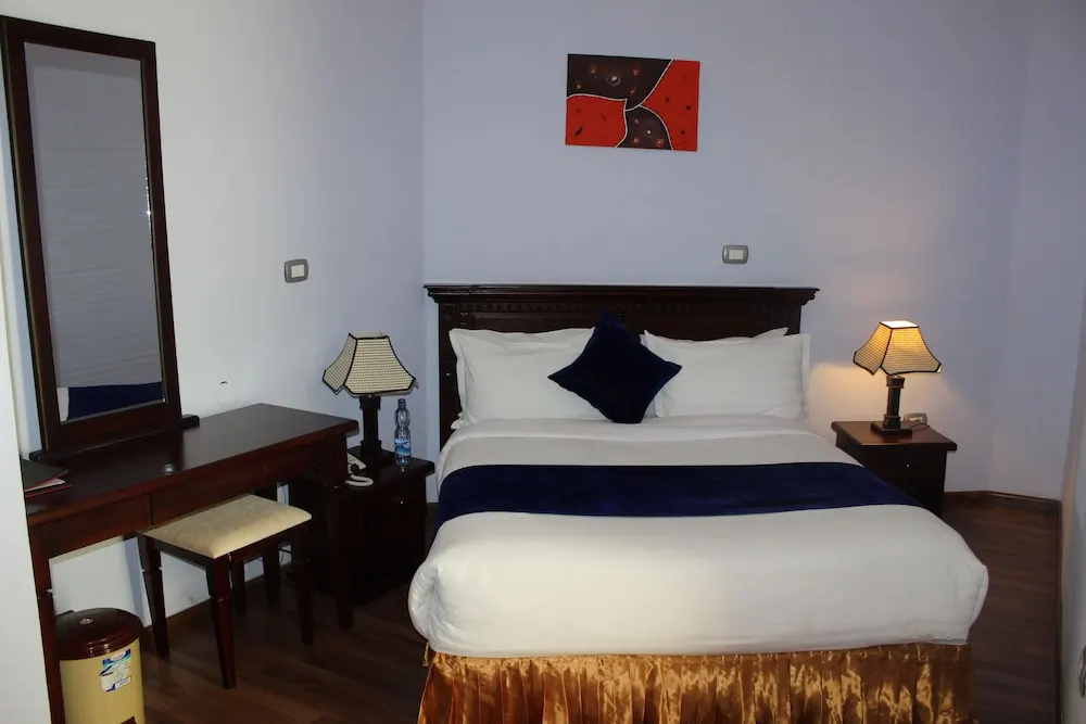 Oasis Hotel Apartment - Chambres