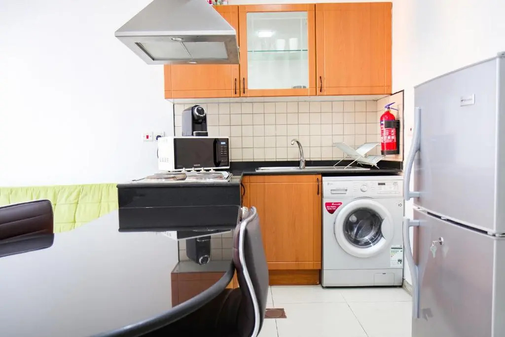 Signature Holiday Homes - Furnished Studio in Spring Oasis - Chambres