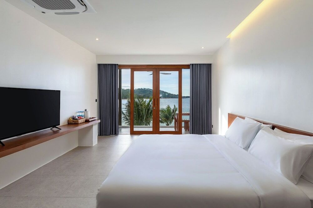 Двухместный номер Superior с видом на море двуспальная кровать в X-sea khanom Harbor Bay Resort