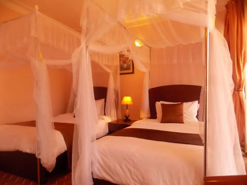 Entebbe Travelle'rs Inn - Chambres