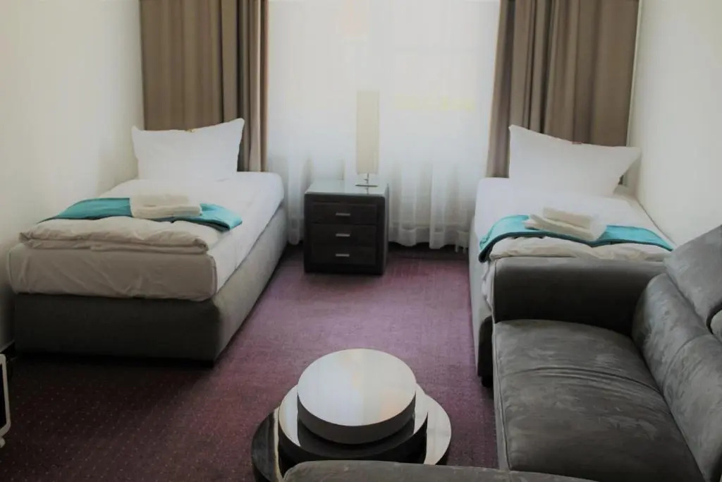 Check Inn Hotel - Chambres