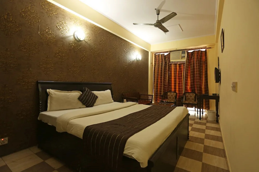 OYO 7844 Hotel Welcome Plaza - Chambres