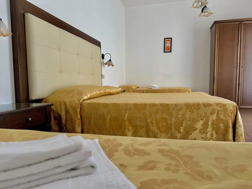 Standard Quadruple room with balcony and with pool view