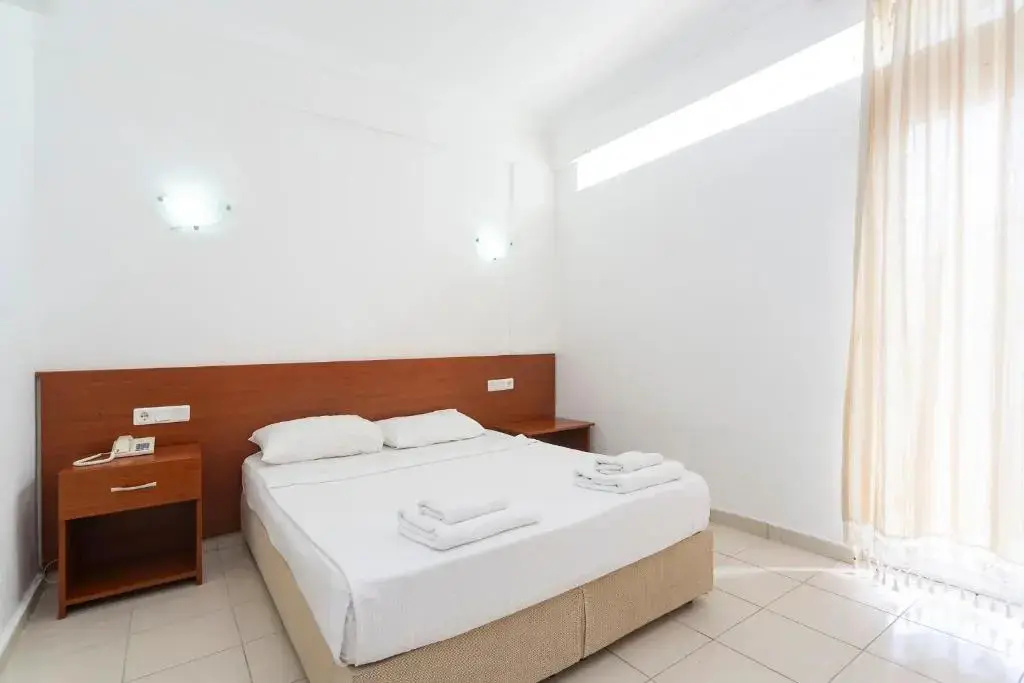 Kriss Hotel - Chambres