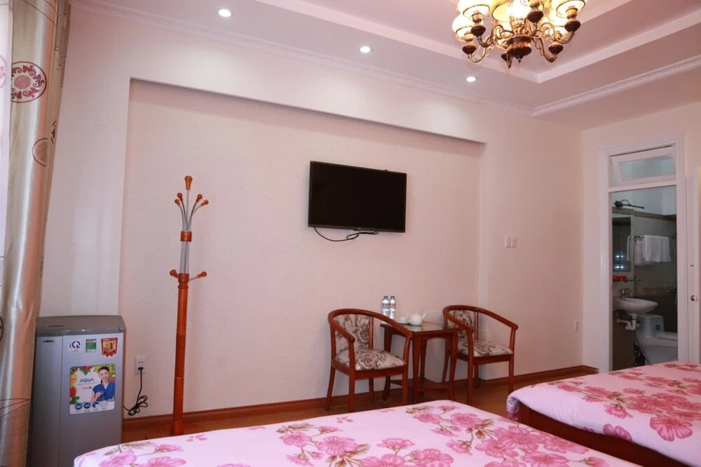 Dang Uyen Hotel - Chambres