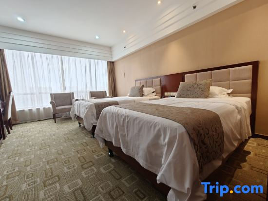 Xinli Hotel - Chambres