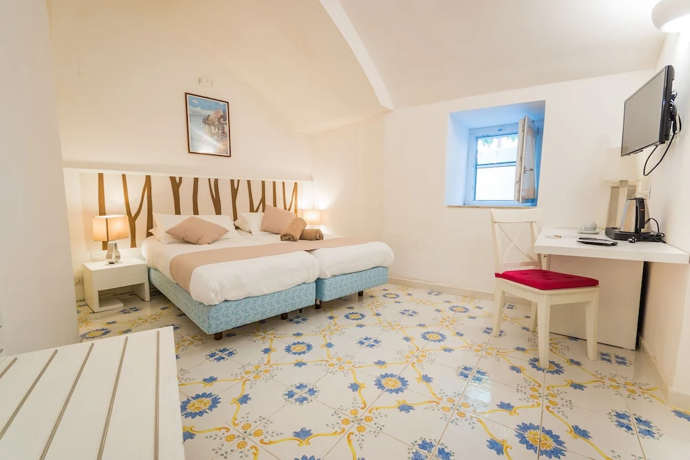 Hotel & Resort Le Axidie - Chambres