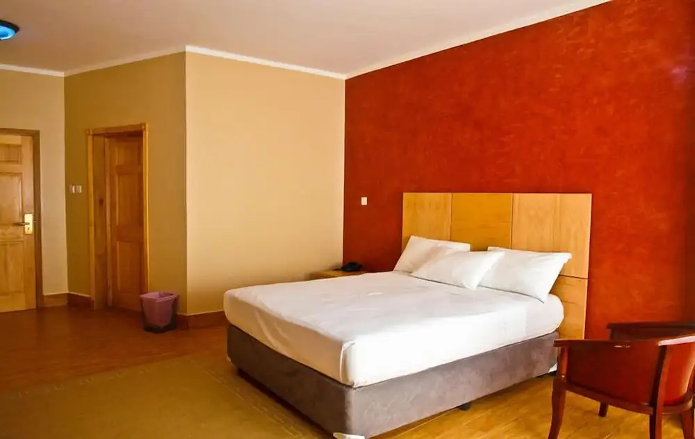 Tropical Enclave Hotel - Chambres