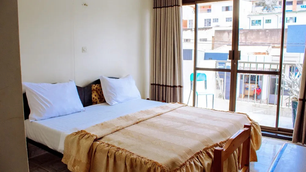 Okapi Hotel - Chambres