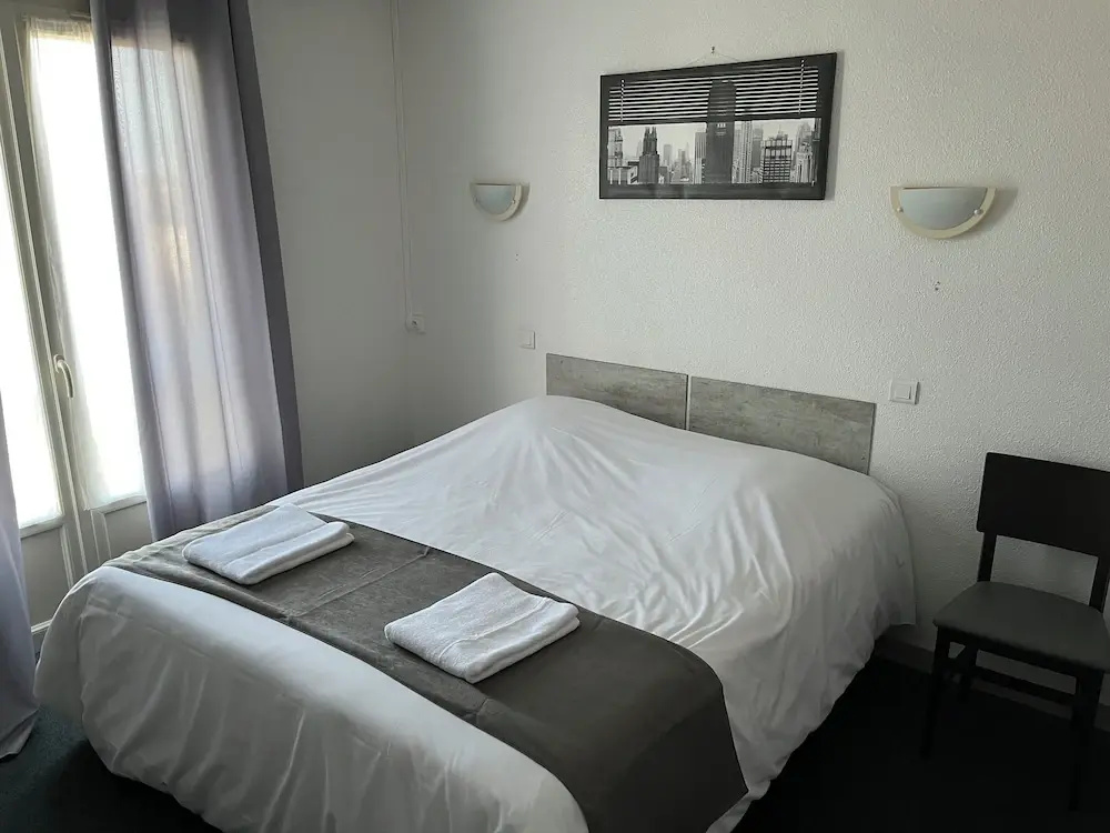 Hôtel Le Lyon Vert Commentry - Chambres